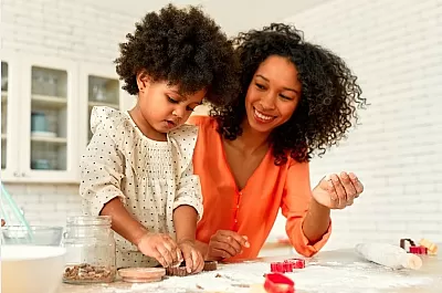 Mother and daughter baking